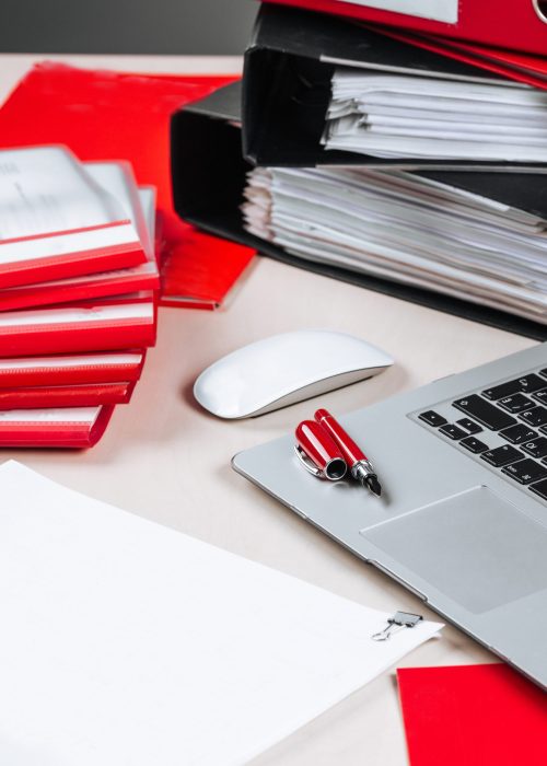 office-working-place-laptop-pen-mouse-folder-table